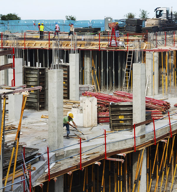 imagem ilustrativa de trabalhadores da construção civil prédio